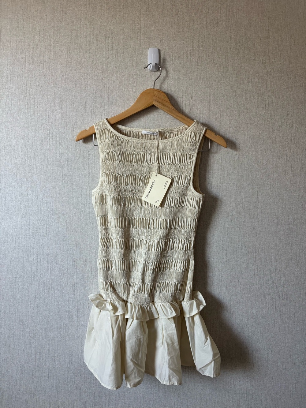 Women’s Sleeveless Cream Ruffle-Hem Dress